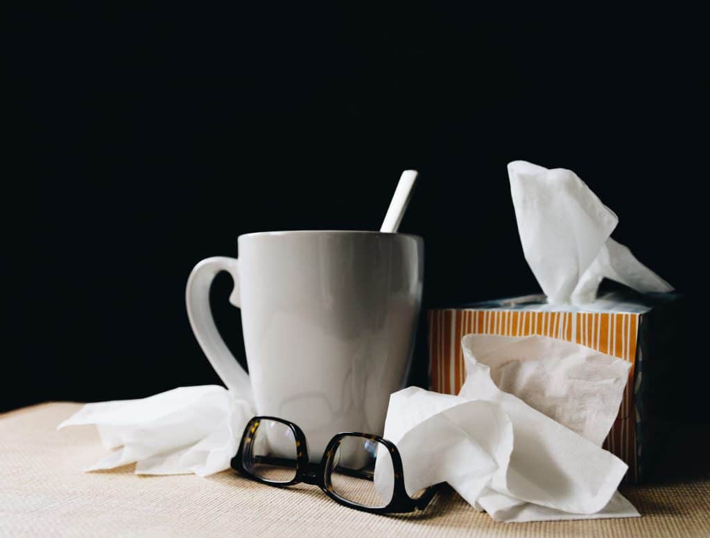 Tissues and cup of soup