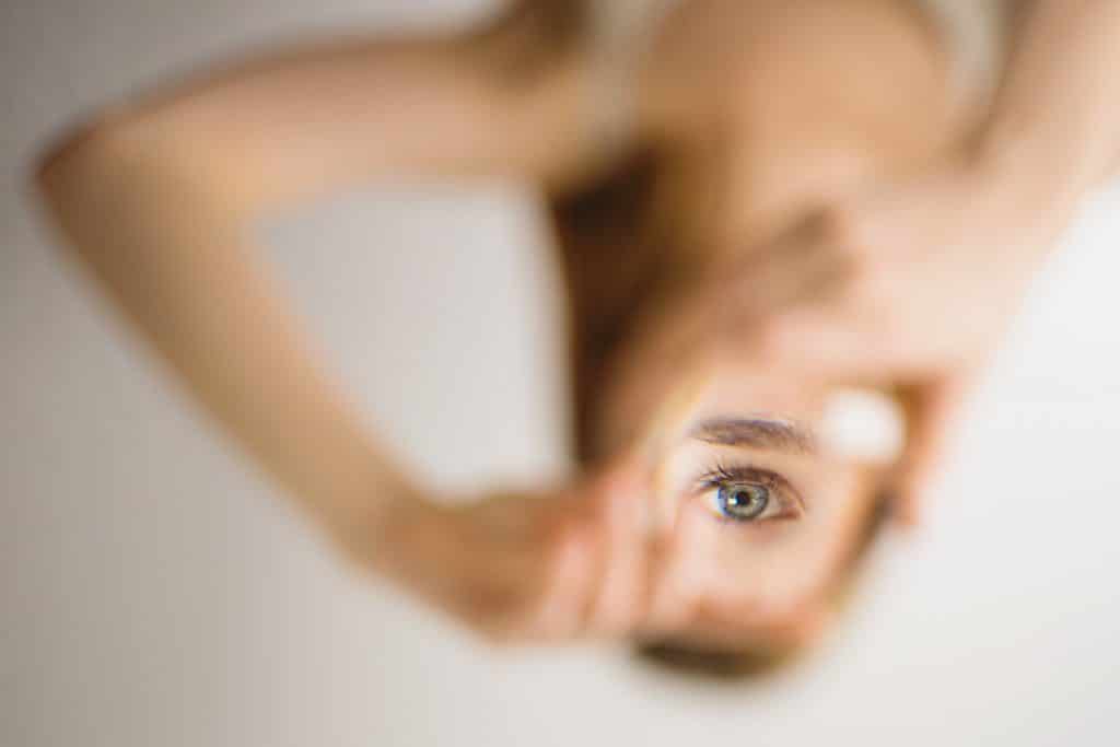 Woman holding mirror