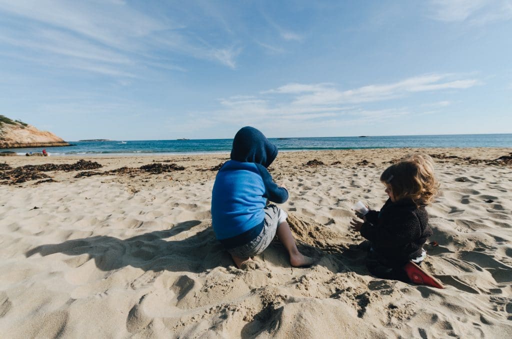 two children playing beach