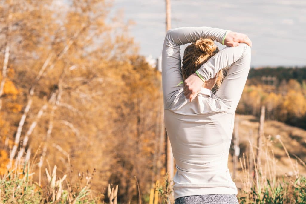 woman stretching morning